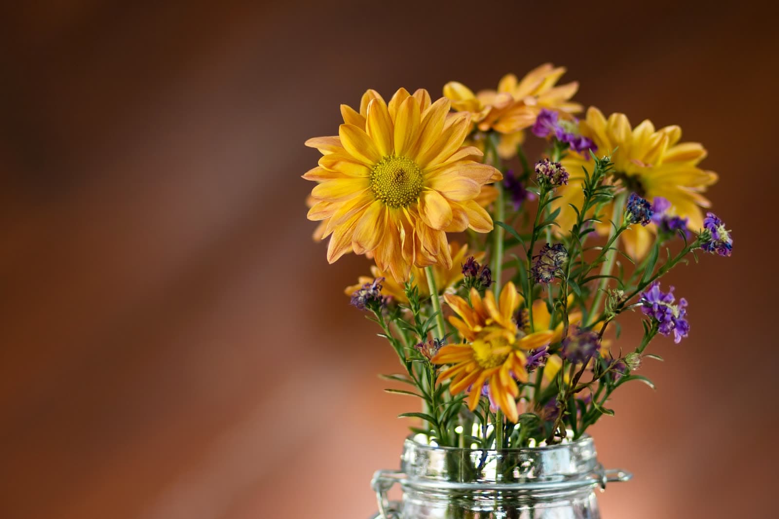 Yellow flowers in a glass vase
